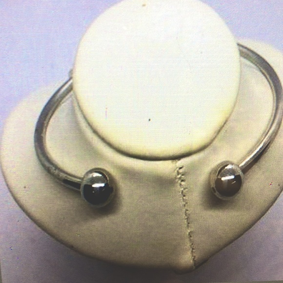 A stunning silver plated cuff bracelet with a cowboy boot charm. - Picture 2 of 2